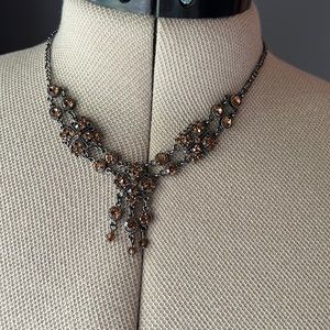 Vintage Champagne Necklace: Amber stones, figaro chain.